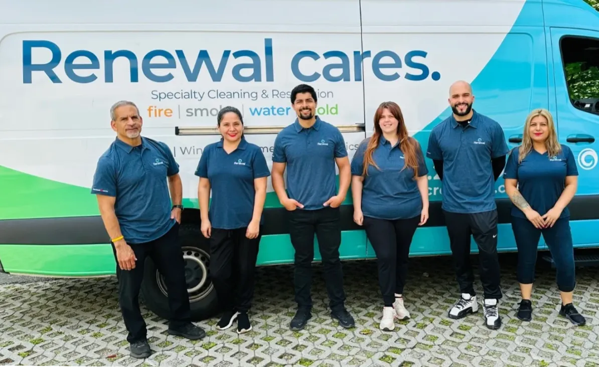 a group of people of fire damage restoration of renewal solutions